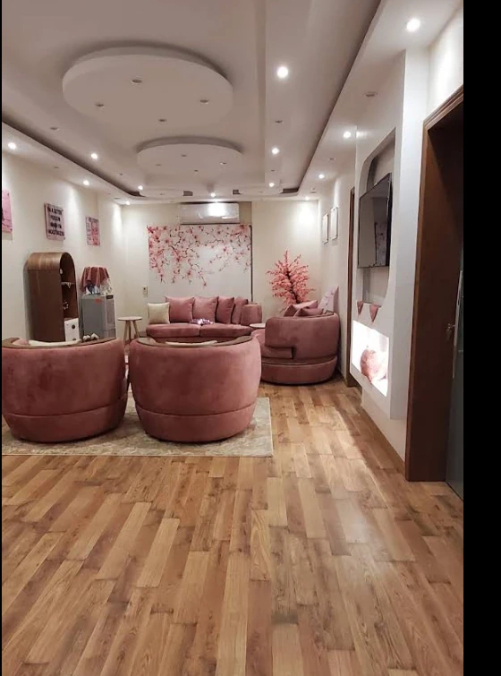 Pink reception seating inside Magenta Clinique New Cairo